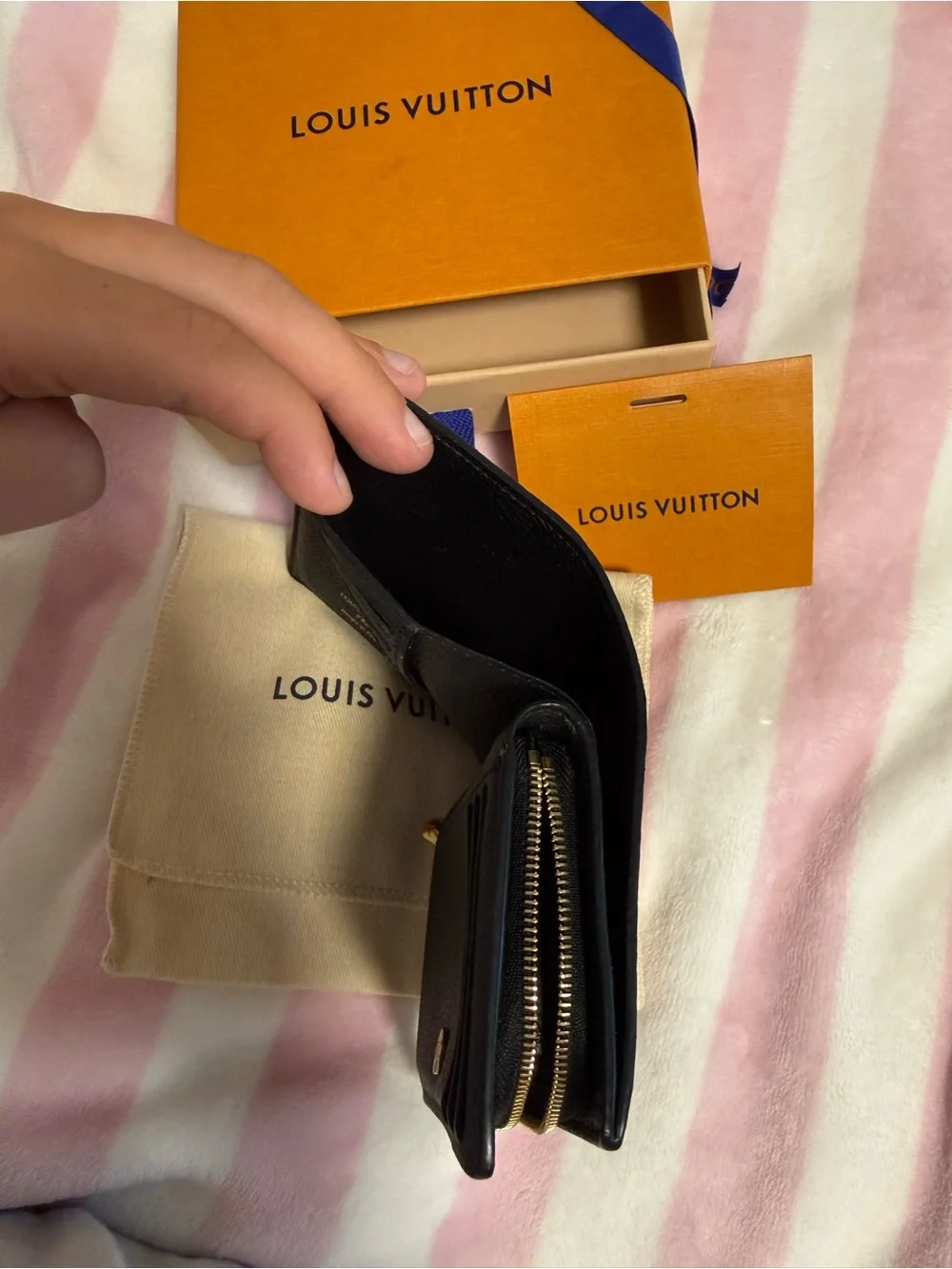 Louis Vuitton Black Pebbled Leather Bifold Wallet with Gold Hardware
